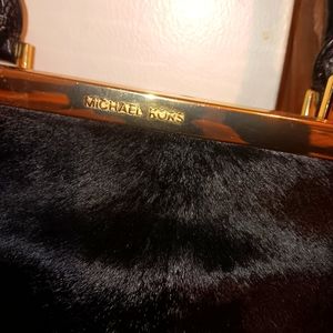 Black Michael Kors Calfskin&Leather purse. Gold Hardware all zippers no pen or h